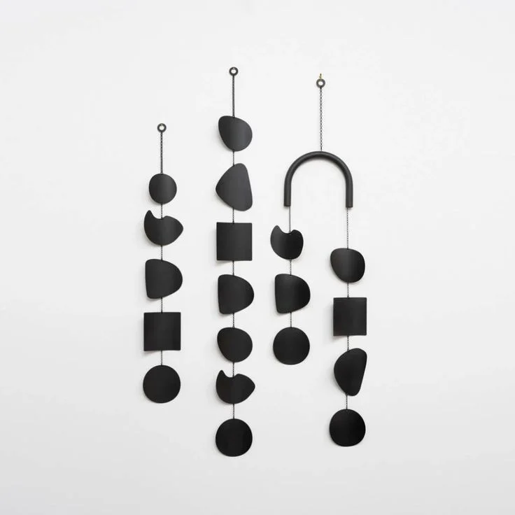 Mineral wall hanging black patina home decoration worn shapes of river rocks