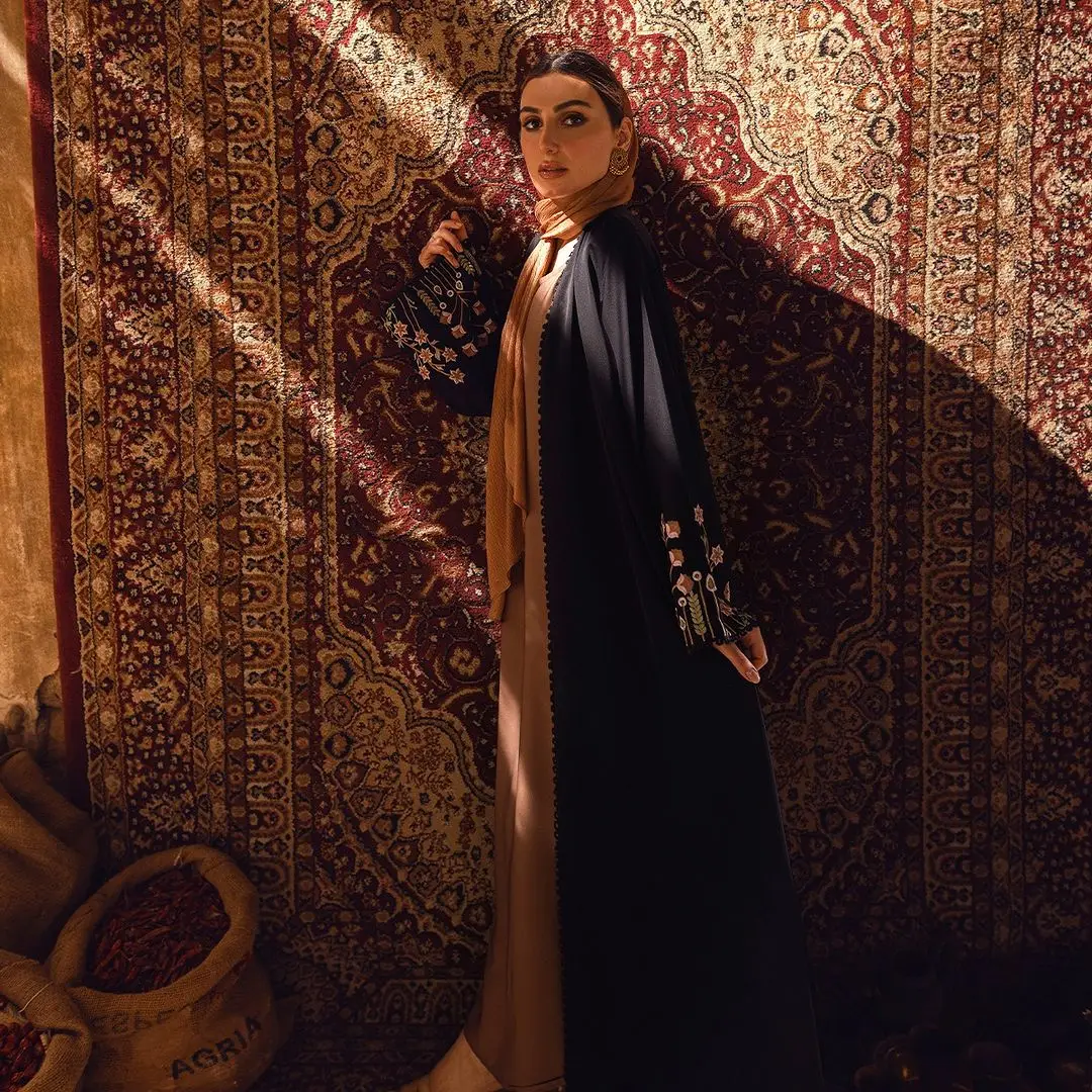 yra Abaya with its delicate floral embroidery, forms a divine feminine vibe making its way with confidence