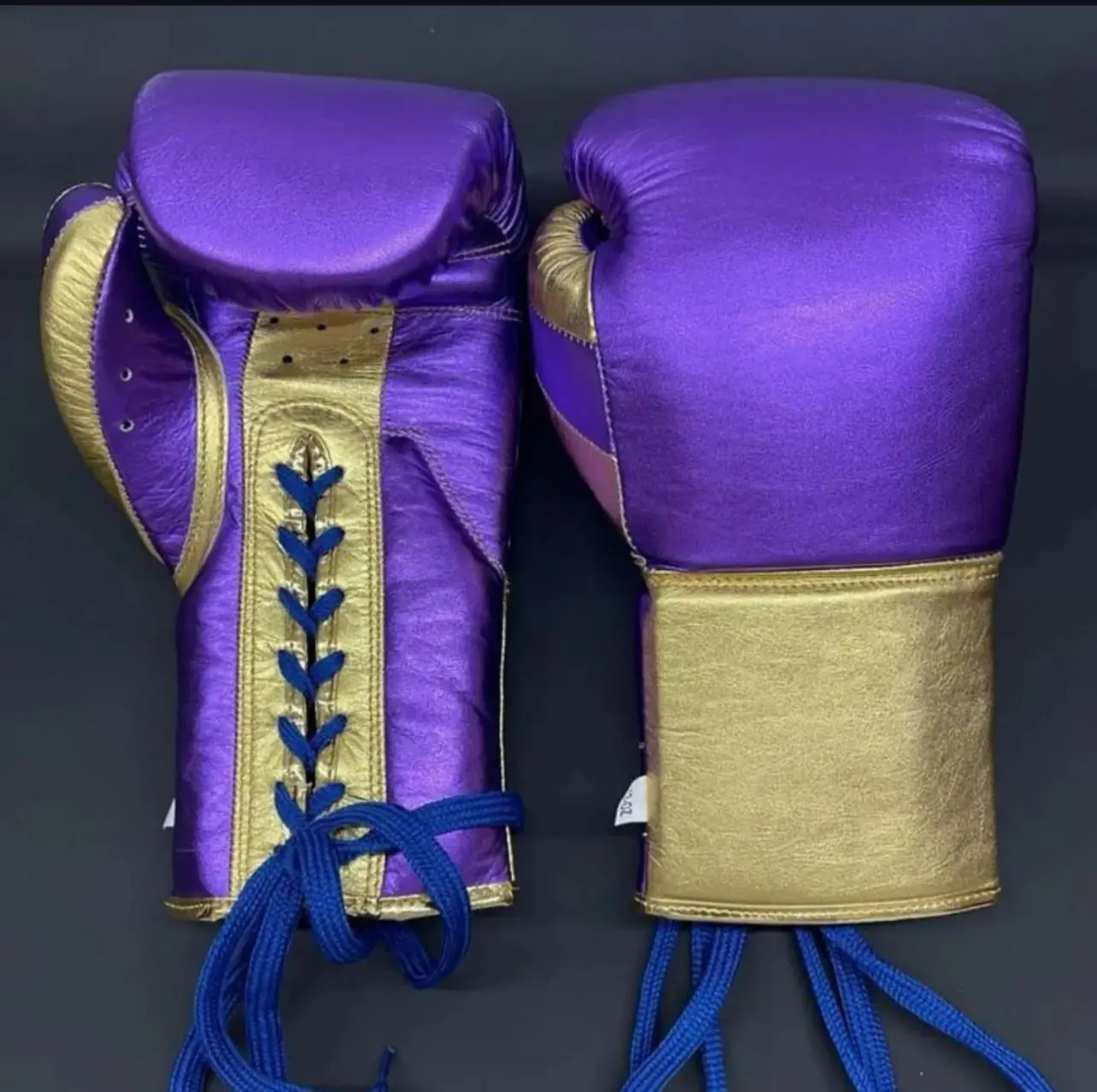 Laces boxing gloves for professional fighter with customized logo and design