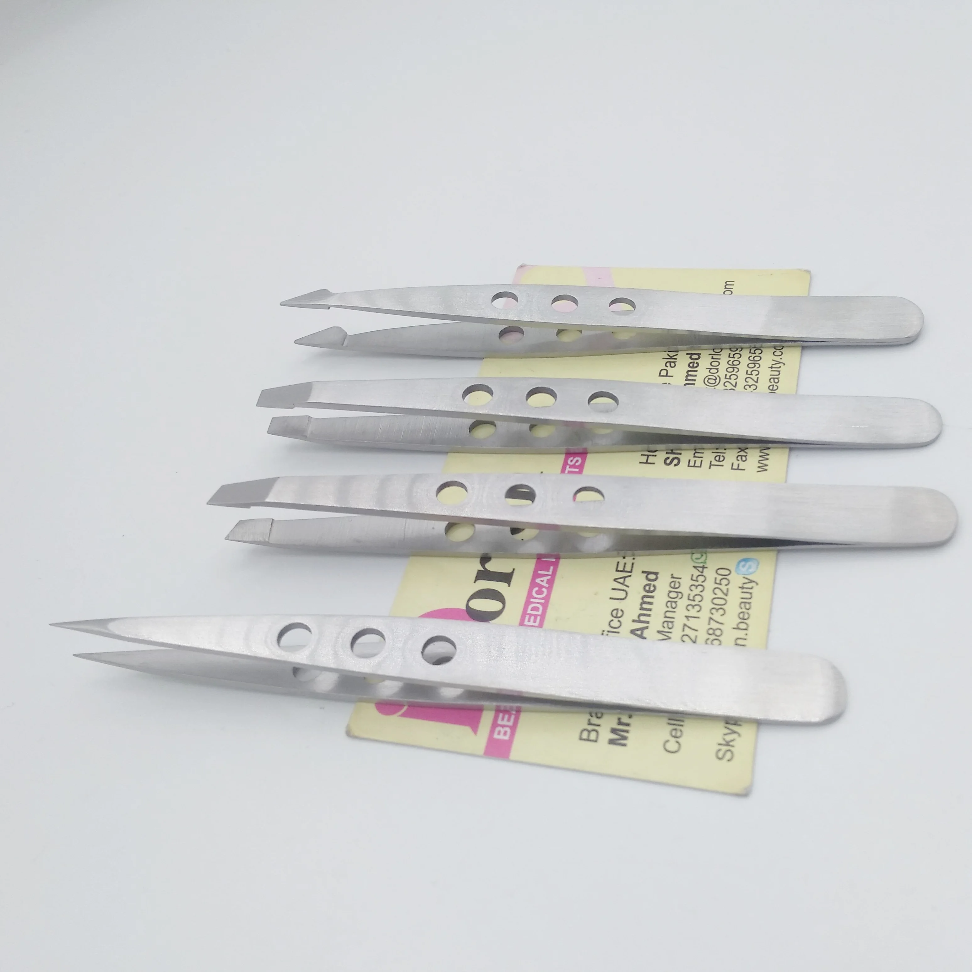 Holes Design Handle Stainless Steel Eyebrow Tweezers Professional Custom Logo Latest Ingrown Hair Removal Slanted Tweezers