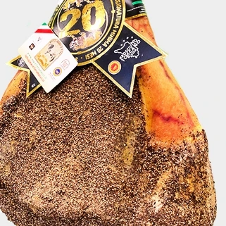 Prosciutto pork cured meat leg from tuscan DOP raw and seasoned