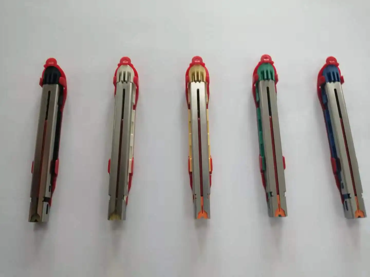 Endoscopic contour curved cutter stapler and reloads for single use