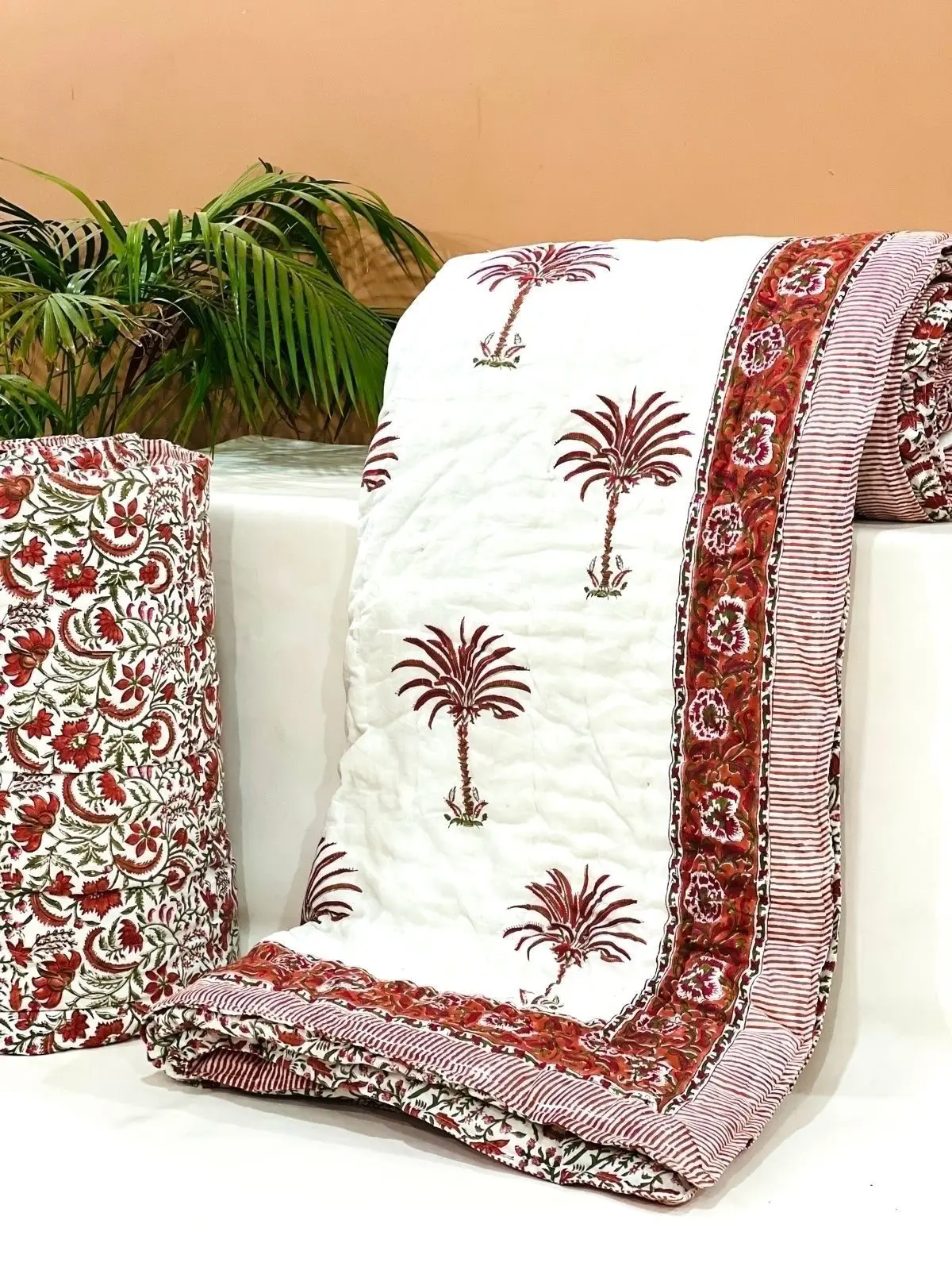 custom made 100% cotton quilts in different designs & various sizes on blue base fabric & multi colour print.