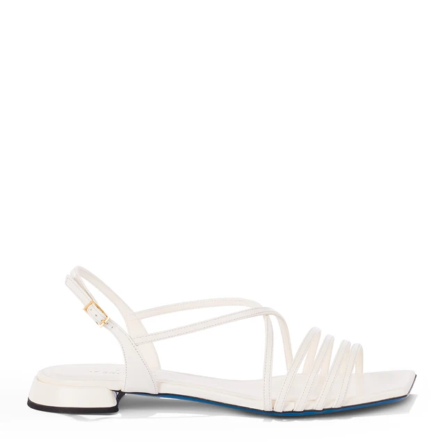 Flat sandals crafted in Italy from cream-tone nappa on multiple thin straps for wholesale