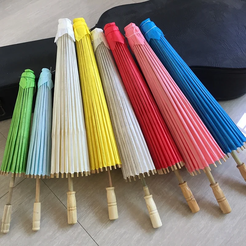 PoeticExist Wholesale Custom Chinese Traditional Handcrafted Out Door Long Straight White Paper Parasol Sun Umbrella for Wedding