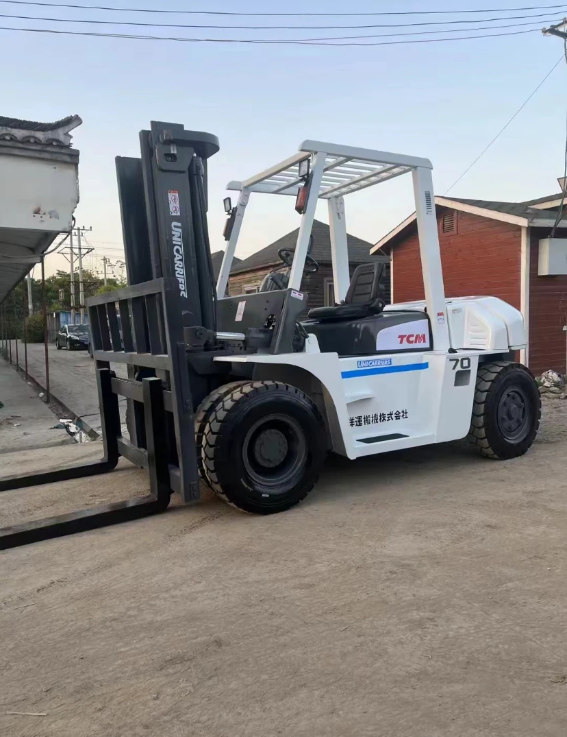 Second hand TCM 7ton forklift good condition for sale made in Japan Isuzu engine White Orange Transporting Used TCM forklifts