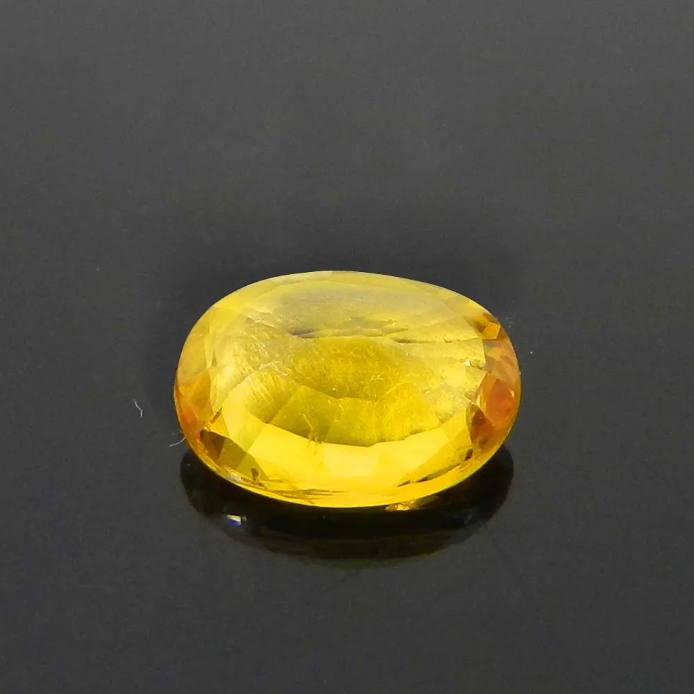 Natural yellow sapphire gemstone 10x7mm oval faceted cut 2.75 cts pukhraj birth stone
