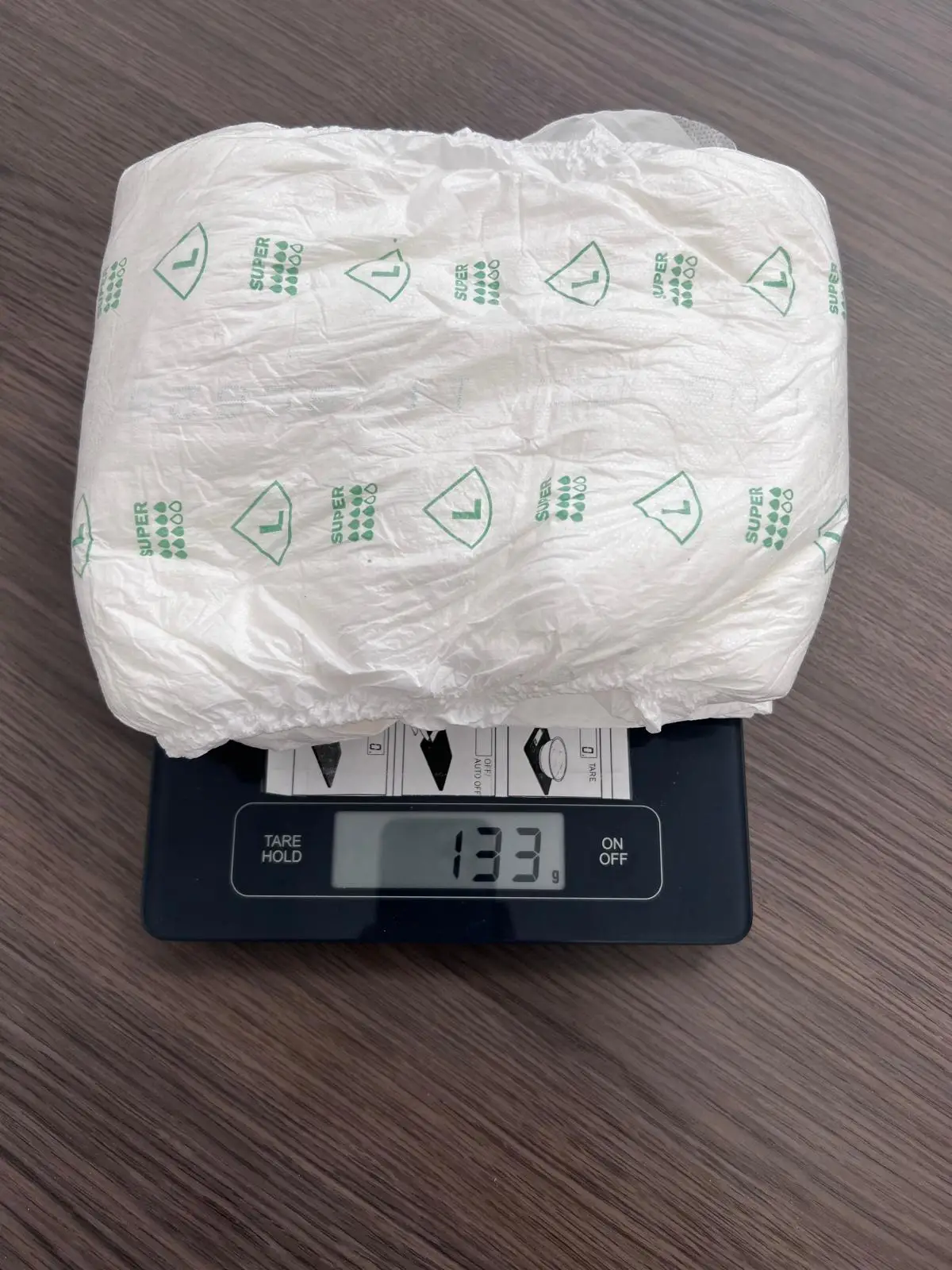 Premium adult diapers in compressed bales (EU)