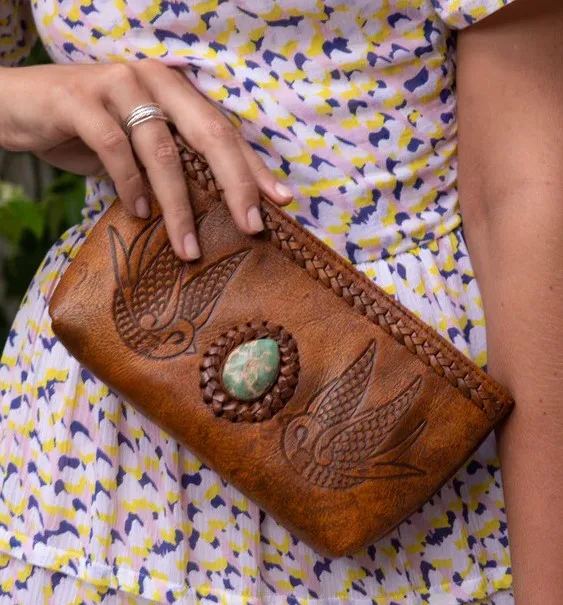 Hand tooled & hand painted Antique Medium Brown cow leather clutch style featuring 2 swallow birds surrounding a large Stone