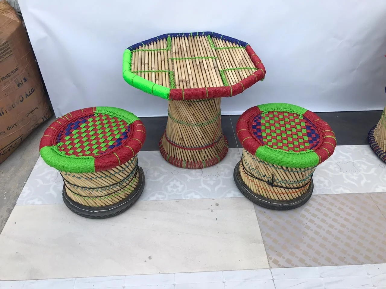 Wholesale Eco friendly Bamboo Rattan Indoor Outdoor Garden Lawn Backyard Furniture 4 Ottoman Stools With Table
