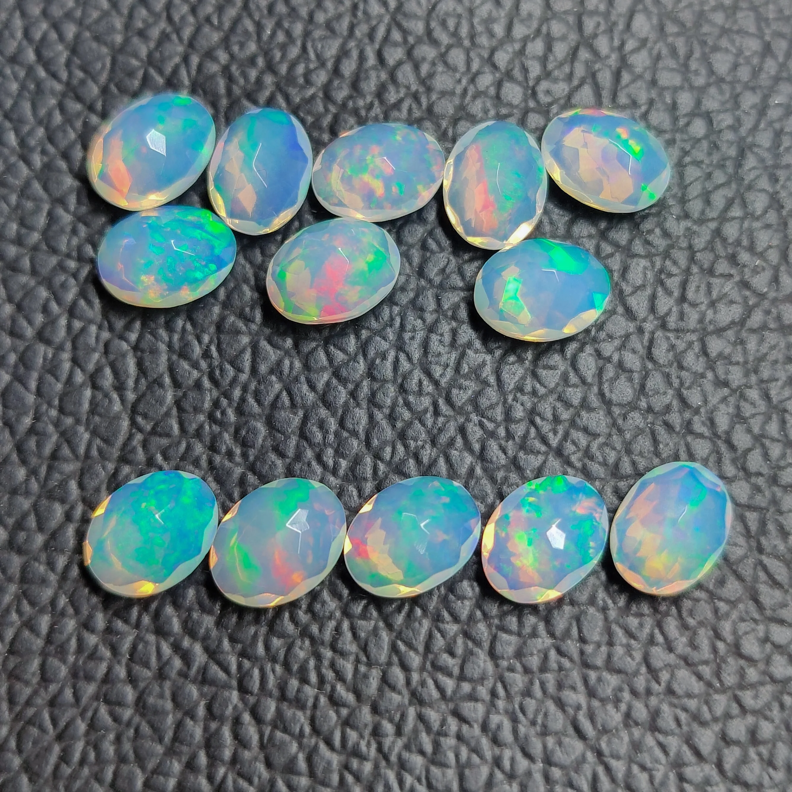9mm 11mm Ethiopian Opal Faceted Oval Multi Colour Opal AAA Quality Loose Gemstone Wholesale From Manufacturer DIY Alibaba 2024