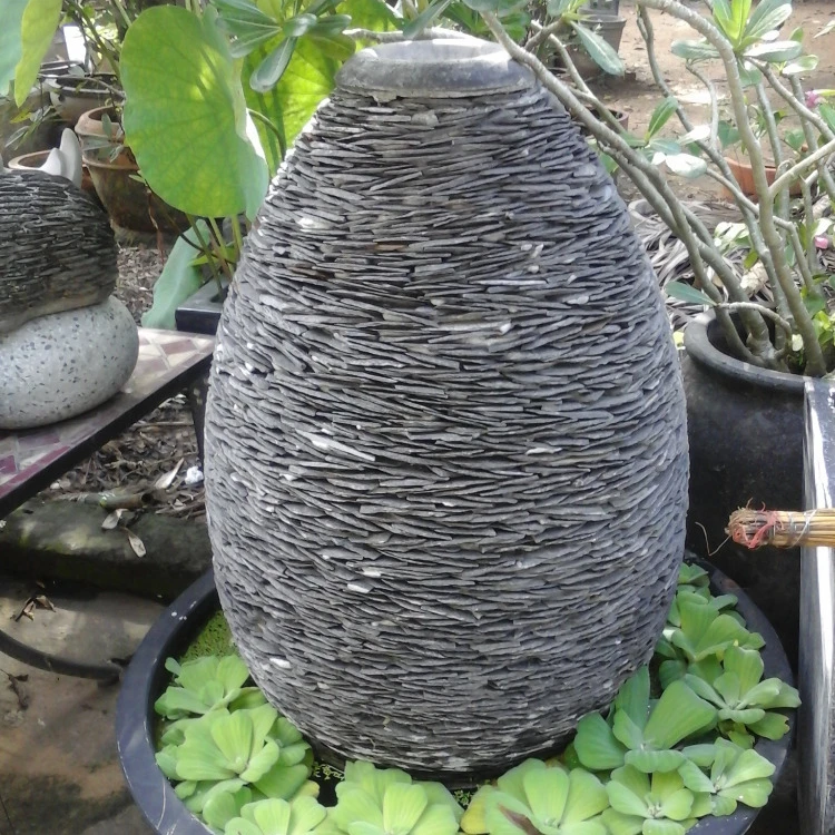 Pebble & Slate water feature fountain - Stacked stone walls - Sandstone garden pots