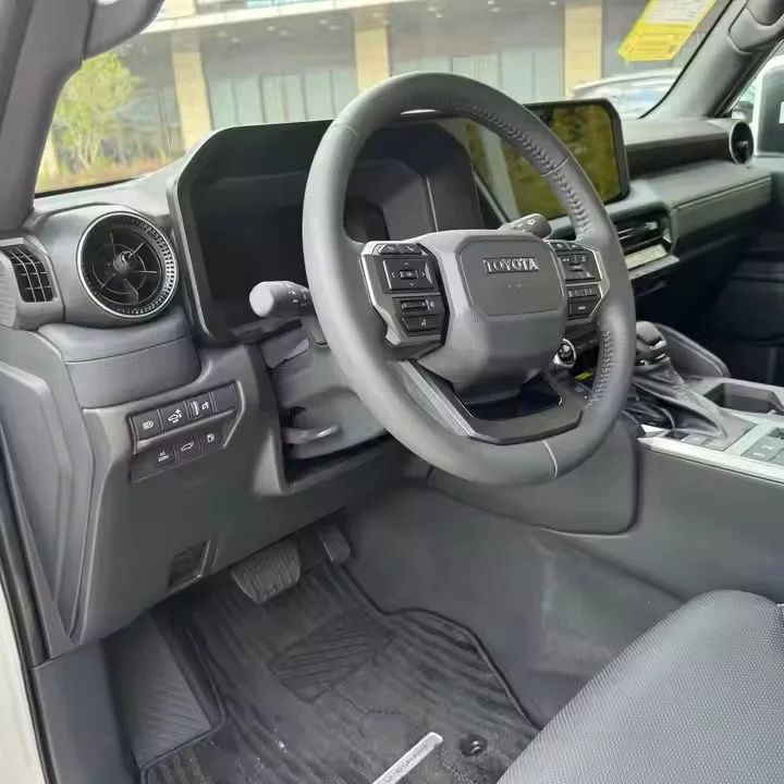 Hot sale chinese used car 2024 Prado SUV 2.4T Hybrid LED 11 Electric Metal Dark Long Range 4WD Car Left Manual ACC for Toyota