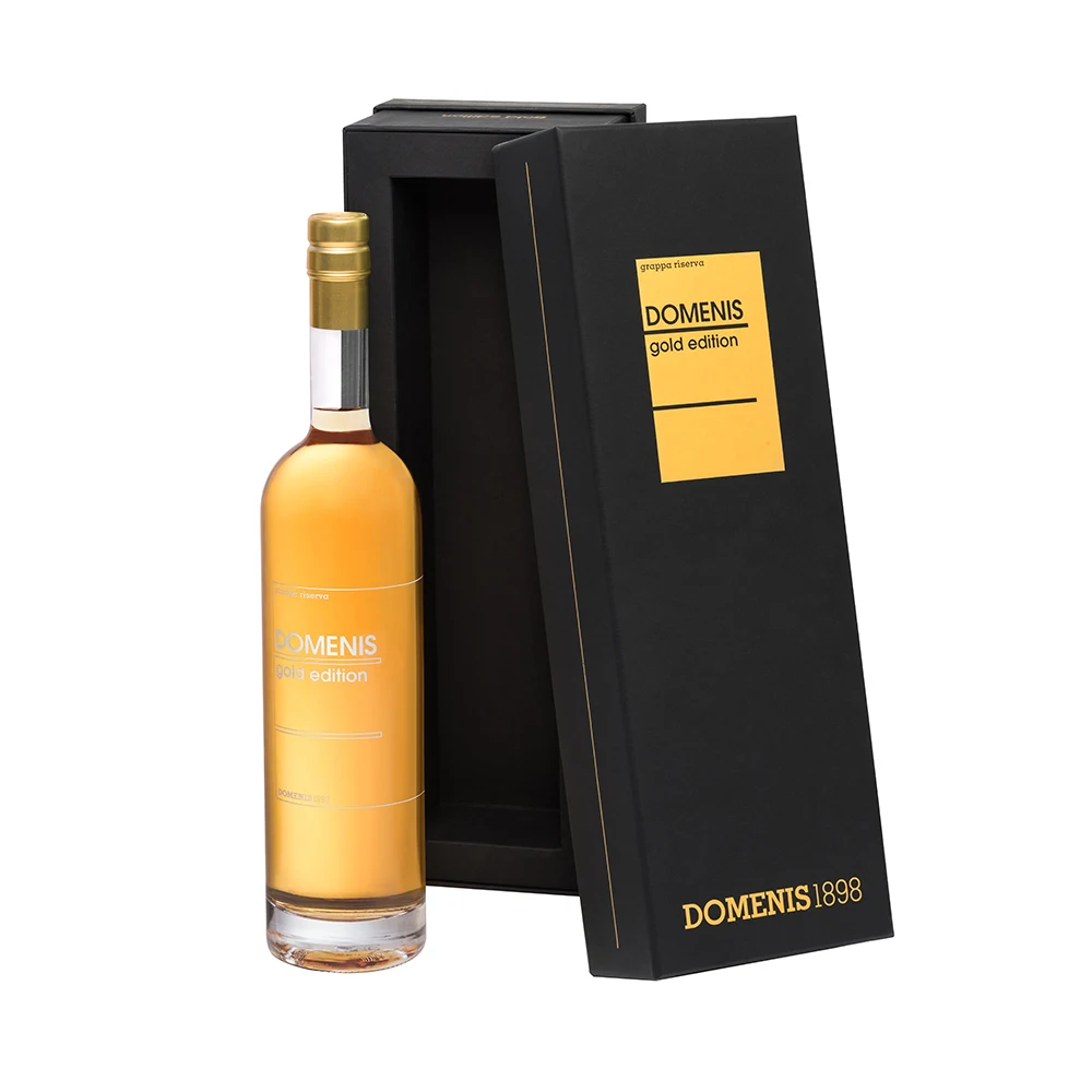 Exclusive Riserva Grappa DOMENIS Gold Edition 70 cl elegant glass bottle with a refined case