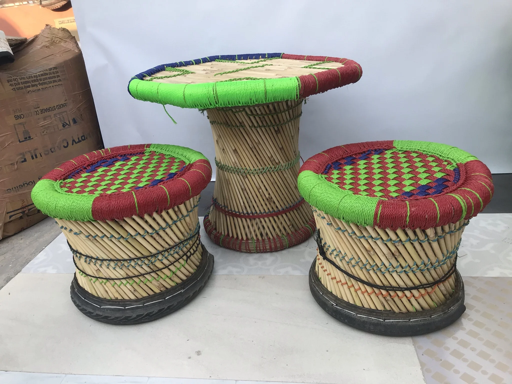 Wholesale Eco friendly Bamboo Rattan Indoor Outdoor Garden Lawn Backyard Furniture 4 Ottoman Stools With Table
