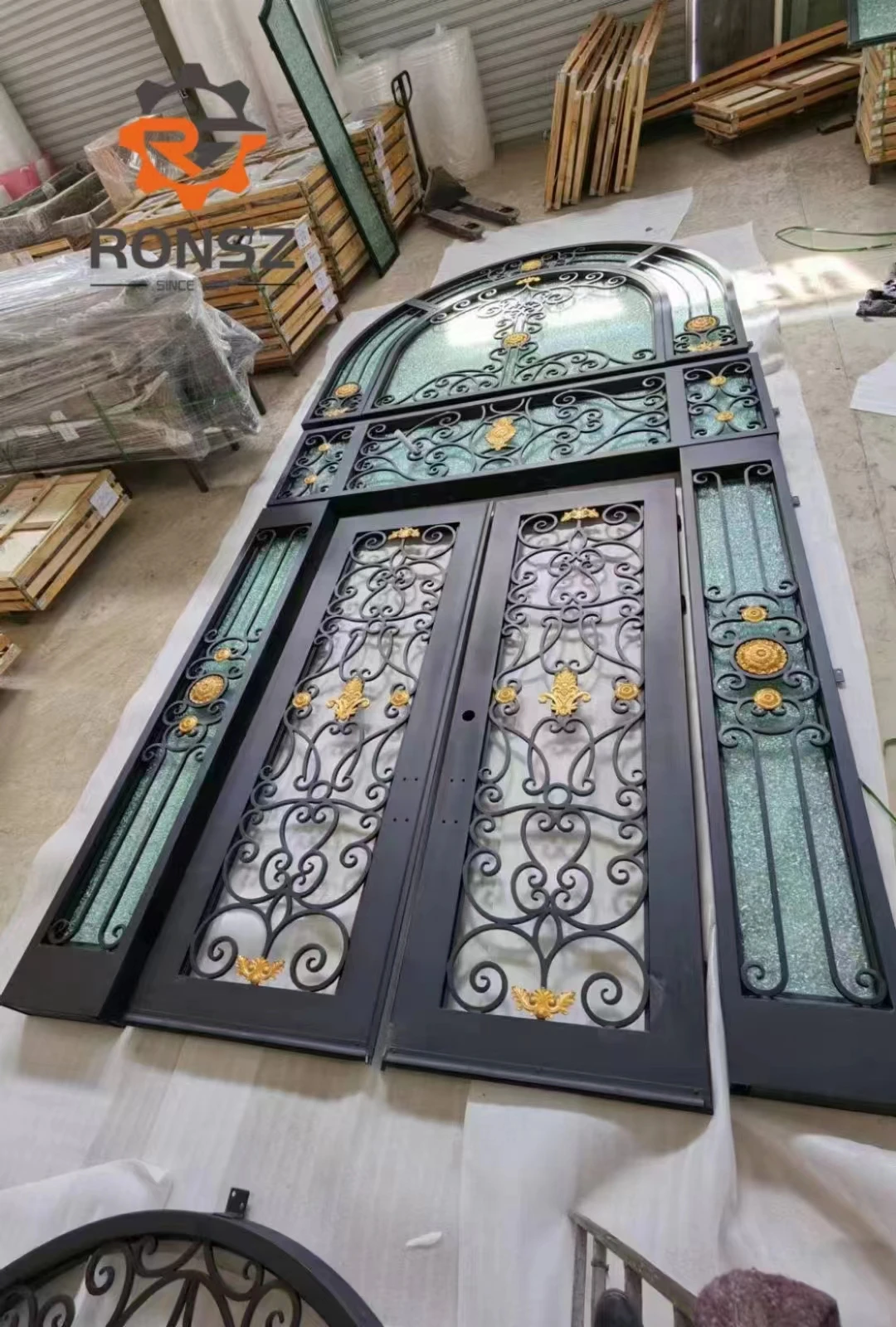 decorative small arched transom design security exterior vented glass double swing open outside wrought iron front entry door