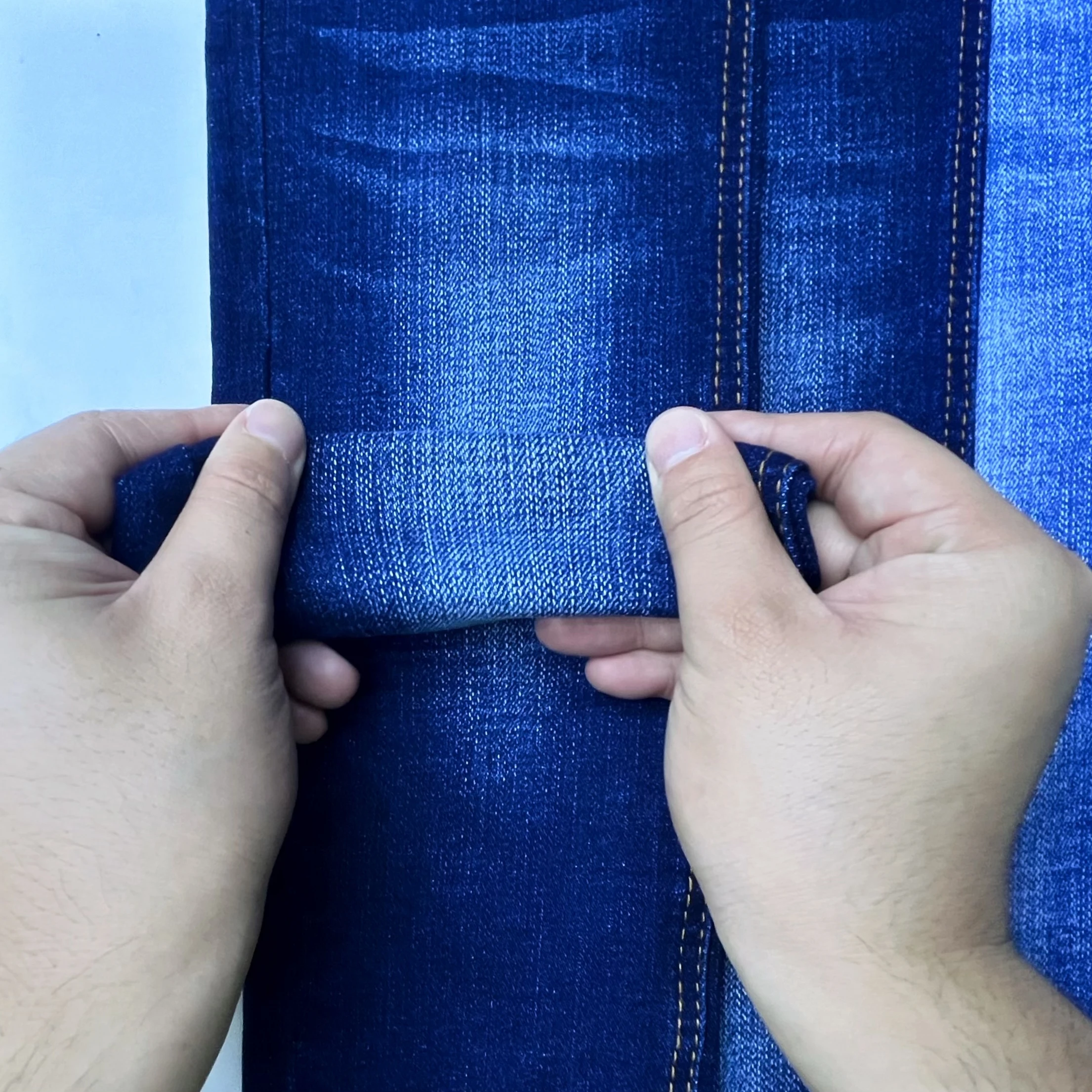10.5oz Factory Direct Sale 7+7x14 92.5%cotton high stretch slim-fit Jean denim fabric Supplier with 1% elasticity