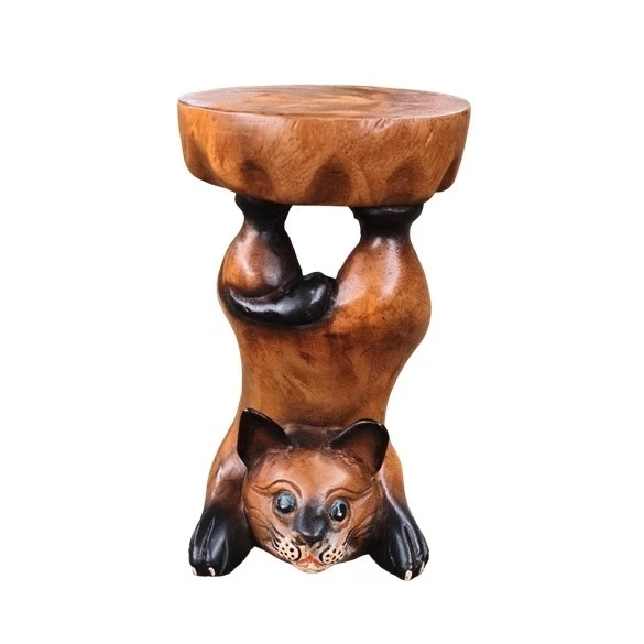 Wooden carved cat doing somersaults From Thailand