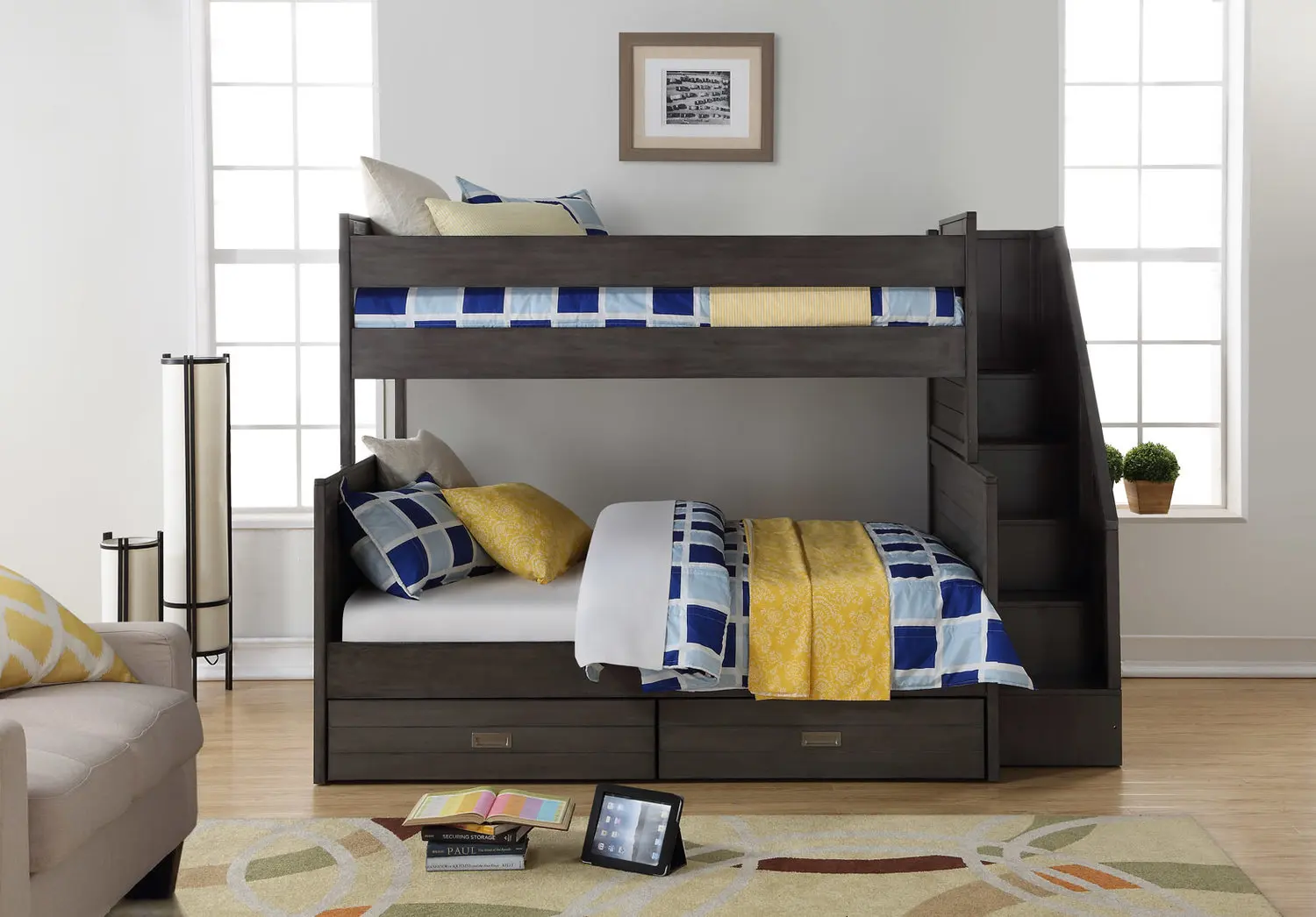 The Dylan bunk beds with stairs feature 6 open-concept bookshelves on the end and manages to retain a classic look