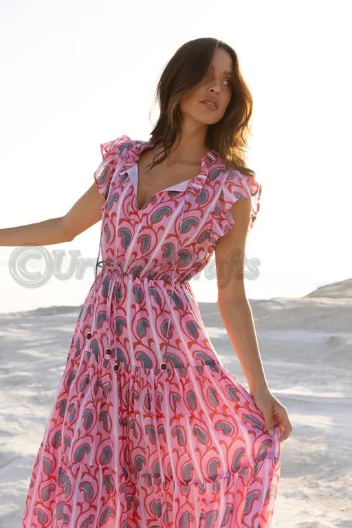 Made from a lightweight cotton voile Fully lined Pullover style Adjustable ties at the waist Flutter cap sleeves