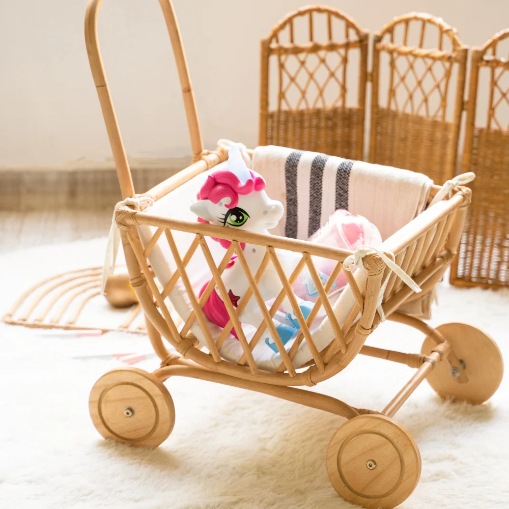 New design eco-friendly natural small rattan foot toys baby stroller cute trolley from Vietnam