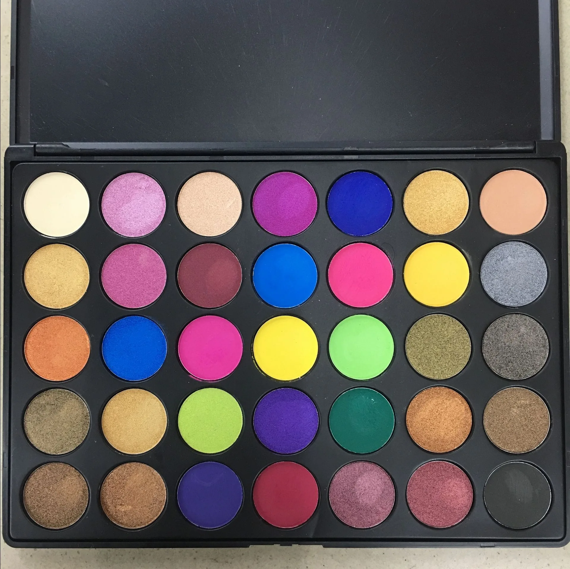 Wholesale make-up cosmetics private label high pigment multi colored eyeshadow without logo 35 colors high quality hot sale