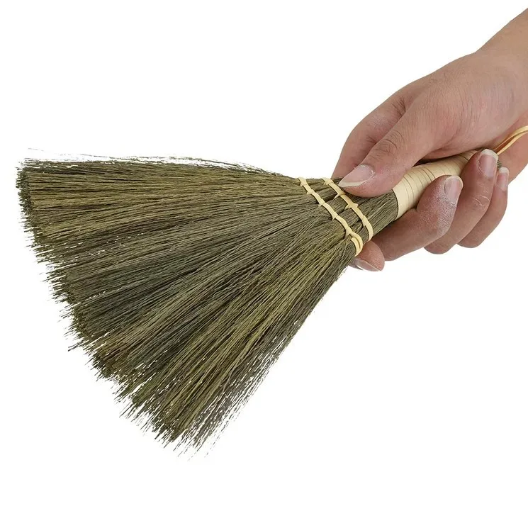 Small soft-bristled broom used to sweep dust in the house