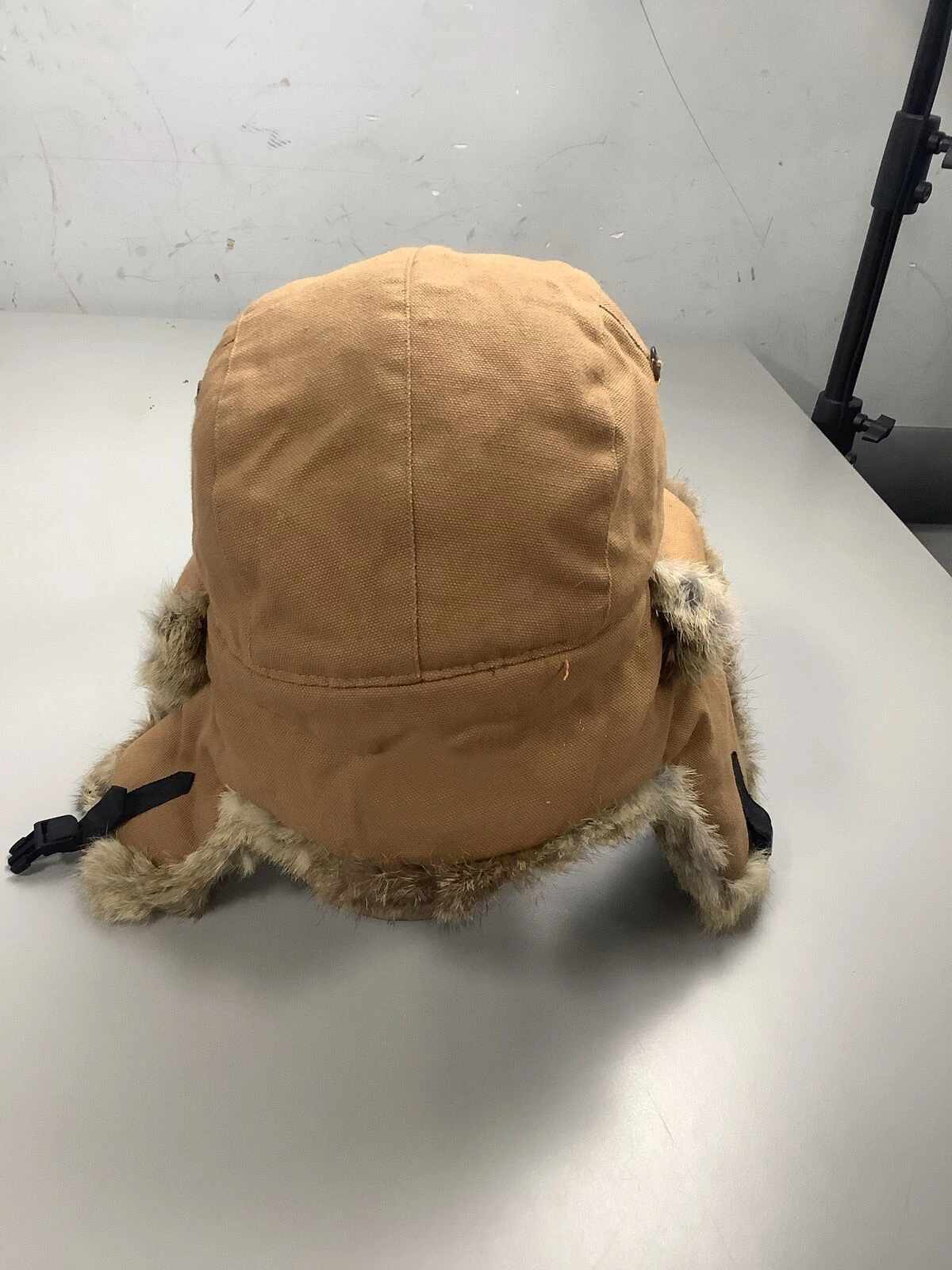 Fully customable wool Russian Aviator cap for men with warm fur lining and adjustable chin strap for winter and skiing