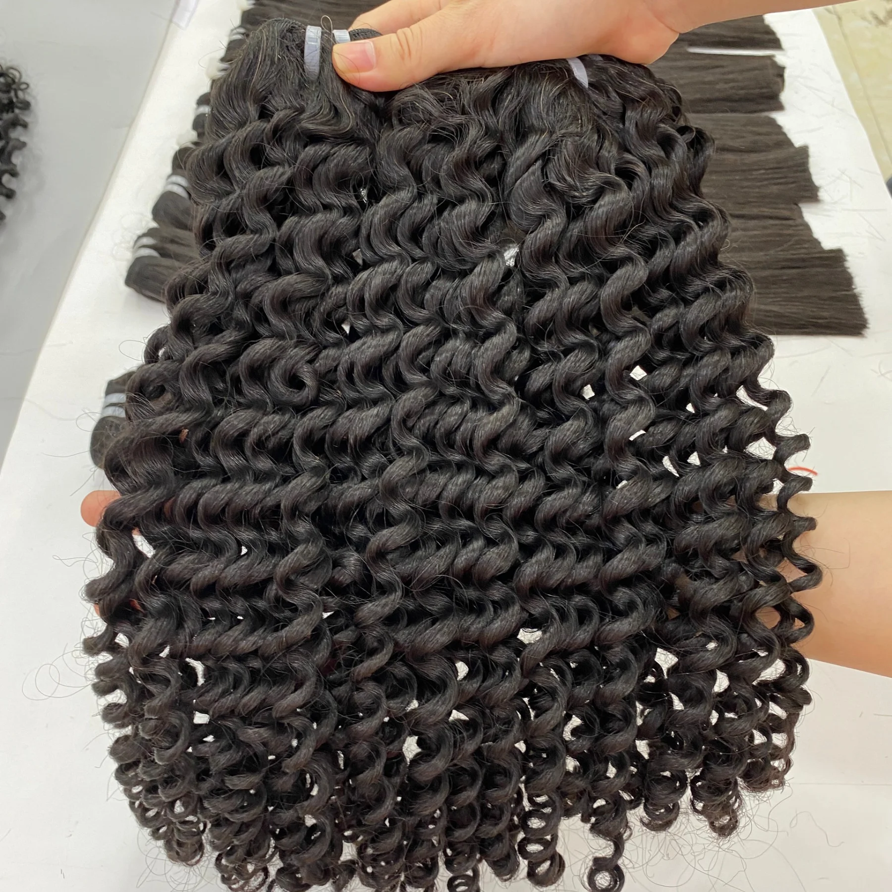 Best selling natural curly hair by Vietnam manufacturer professional weave hair many texture OEM length hair high quality