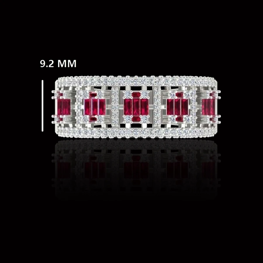 This baguette diamond Ruby Diamond Band is stunning. The 14 karat white gold ruby ring features .15 pcs Ruby  of 94 Pcs Natural