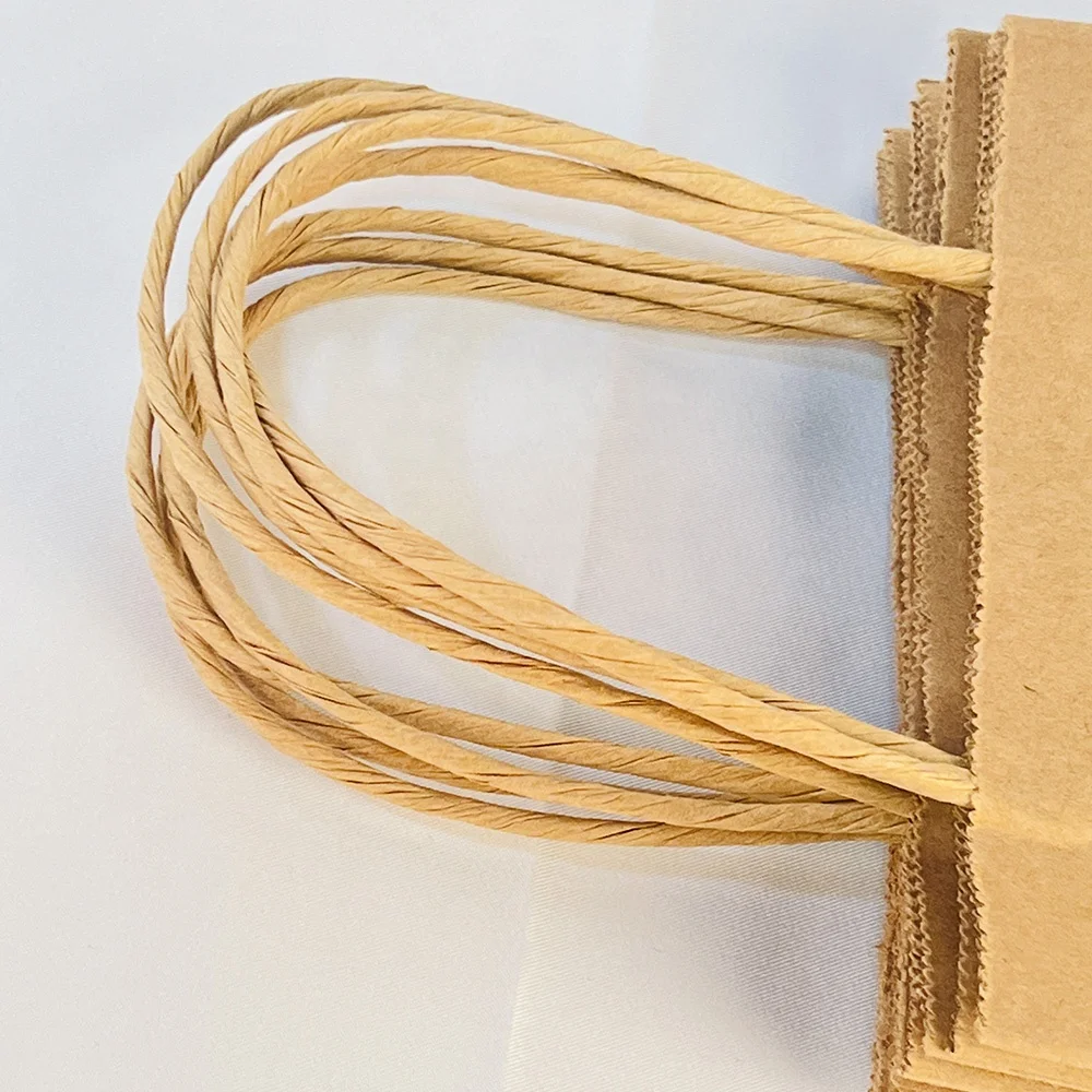 wholesale customized you own logo bolsas de papel brown kraft paper bags with twisted flat handles from China supplier