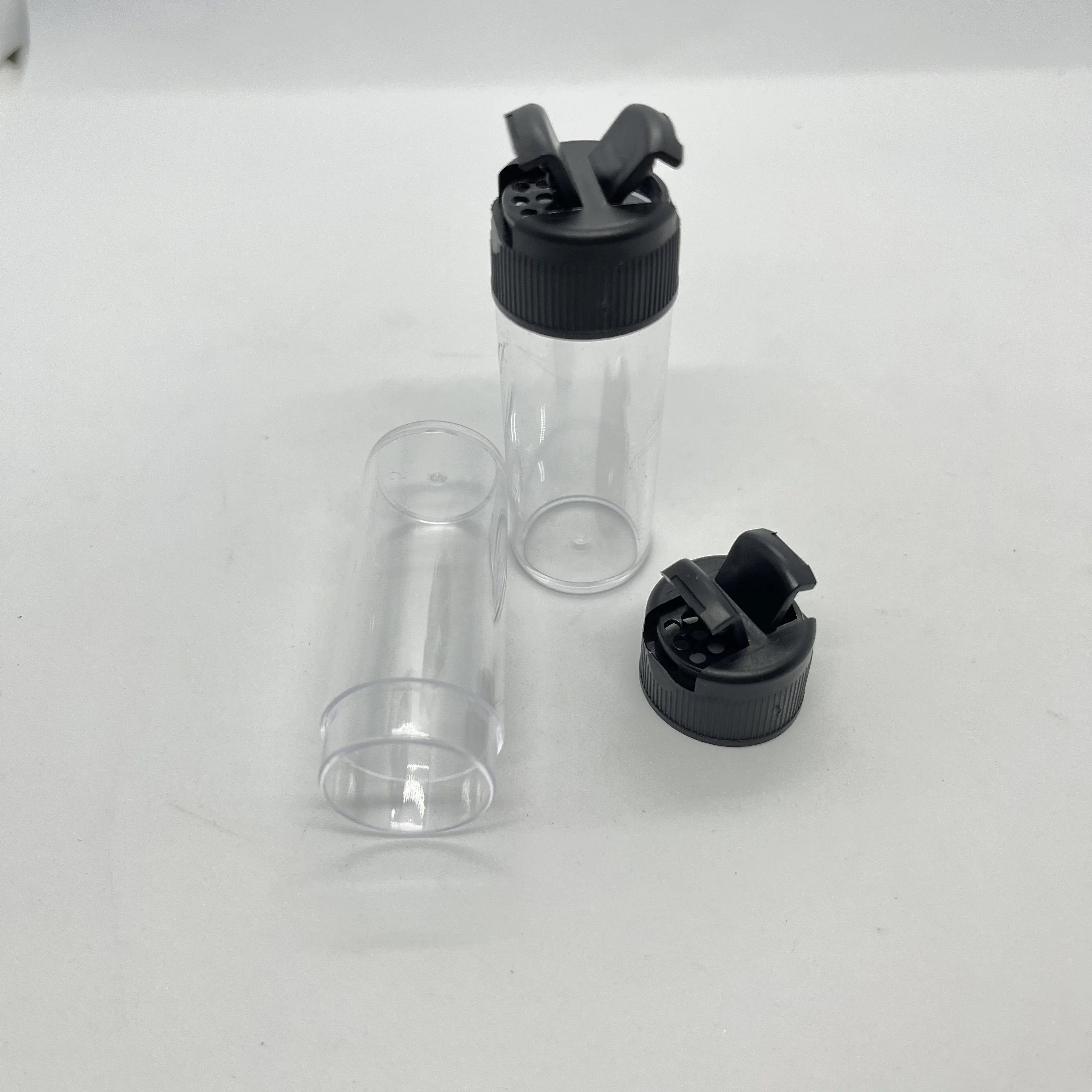 China 18 Ml Black Tops Shaker Plastic Jar With Protective Seal  / 0.6 Oz  Empty  Plastic Shaker Container  For  Powder Storage