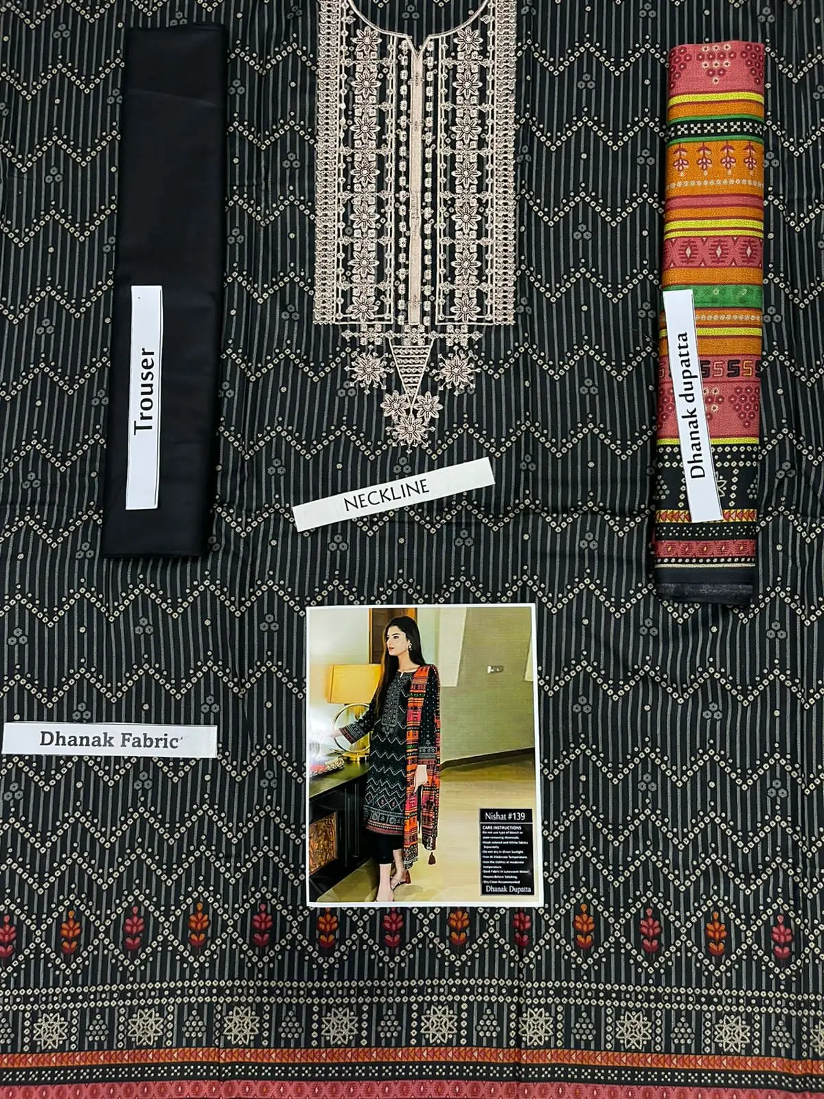 Pakistani wholesale Stitched Linen salwar kameez in Black color over Sequence Neckline Embroidery with Dhanak Dupatta for women