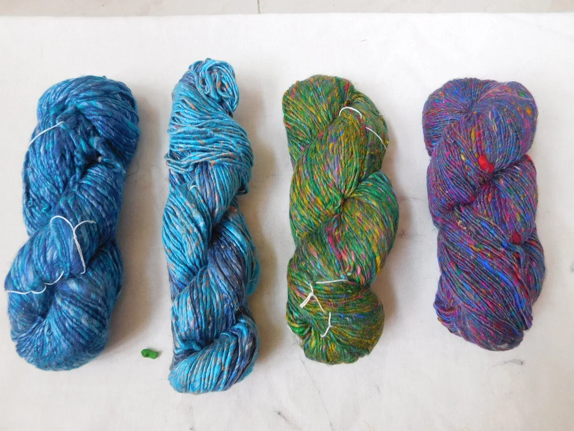 In pastel & multicoloured tweed sari silk yarn with 200 grams length in 100 meters,recycled sari silk fiber for silk yarn stores