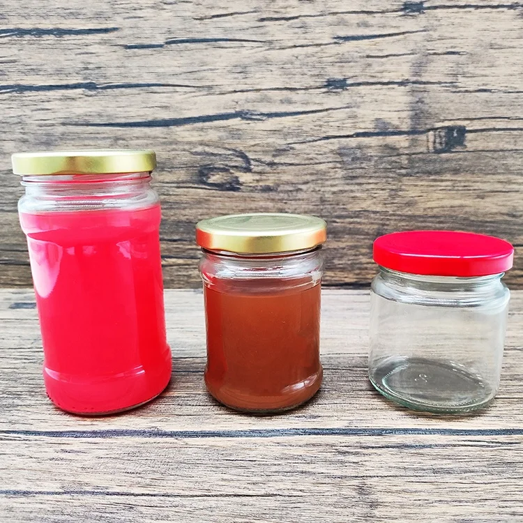 Wholesale 200ml 300ml Round Glass Honey Jar and Golden Metal Lug Guacamole Peanut Butter Glass Jar with Twist Off Lid