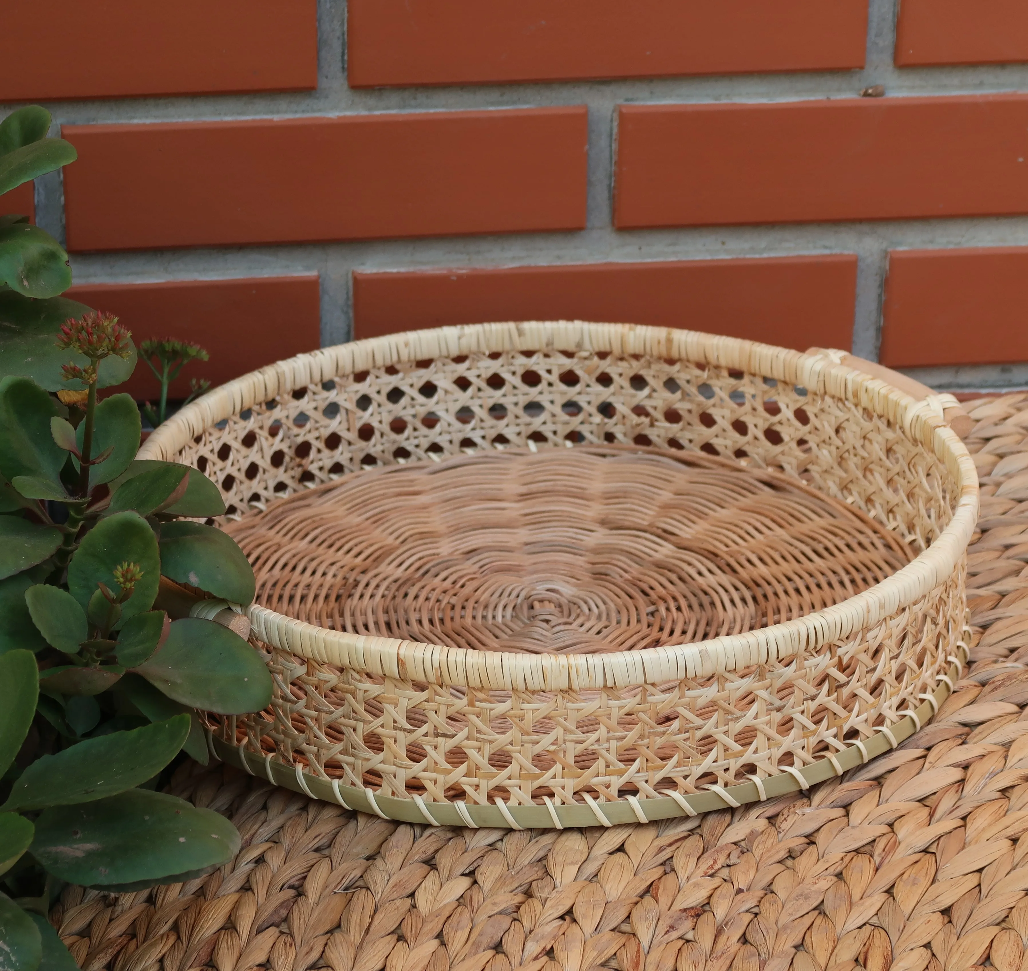 Versatile rattan fruit basket, handcrafted in Vietnam, perfect for storing fruits or as a decorative piece made in Vietnam
