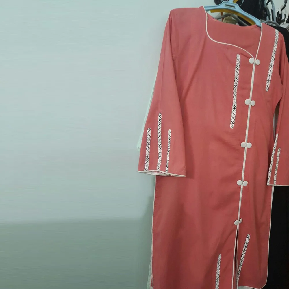 wholesale pakistani kurtis In Coral Color over Button at neckline and Front with laces work at sleeve at lawn cotton fabric