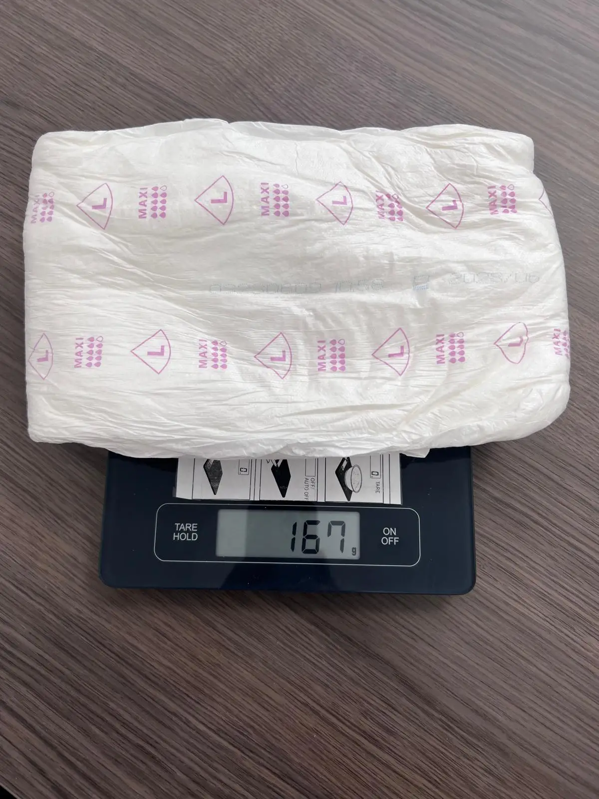 Premium adult diapers in compressed bales (EU)