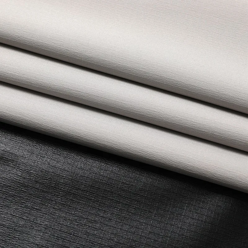 High Quality 0.5cm Ribstop Waterproof Polyester T800 Pongee Fabric with Black TPU Membrane for Jacket