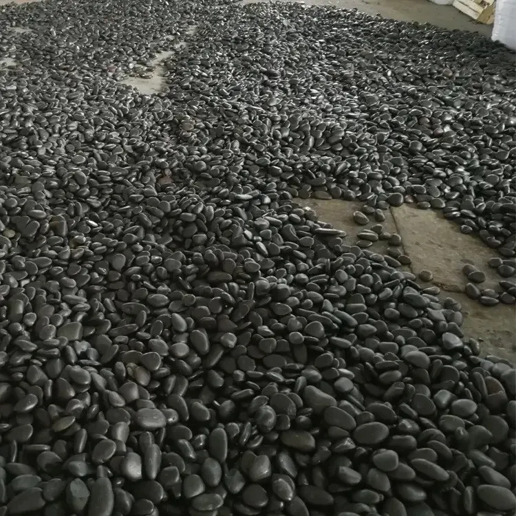 Polished river rocks black pebble stone for landscaping, river pebbles