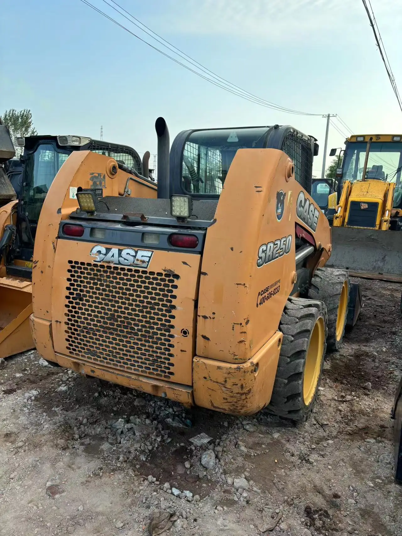 Second Hand SR250 Backhoe Loader Mini Front Loader with Core Motor and Pump Components for Tractor Used CASE backhoe loader