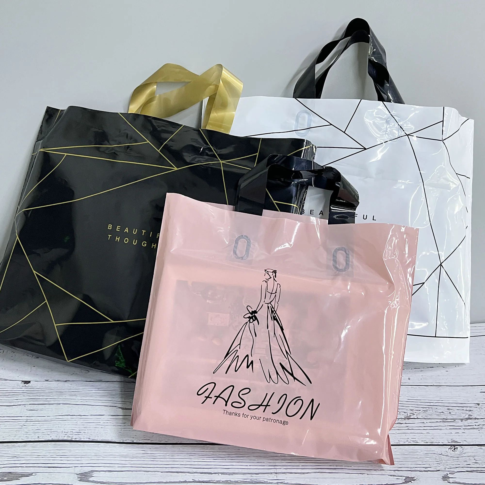 Beautiful Foldable Eco-Friendly Soft Loop Handle Plastic Thank You Merchandise T-Shirt Shopping Bag