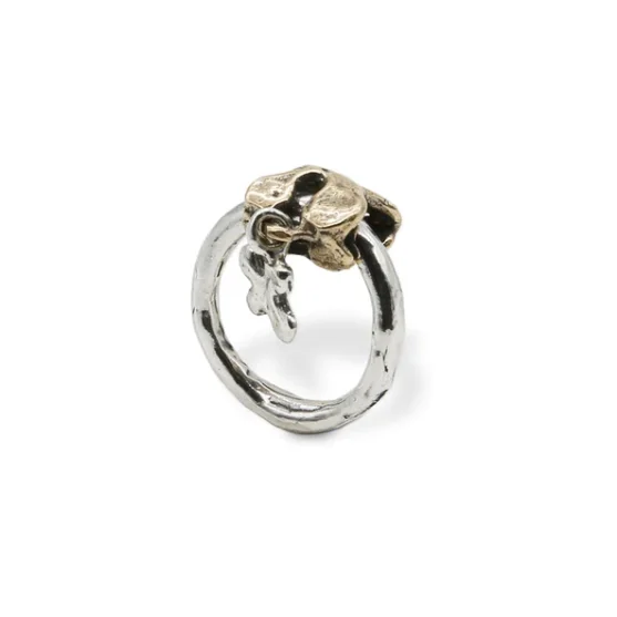 Handmade luxury puzzle charm ring in 925 silver with bronze On the stem of the silver ring runs the bronze element in the shape
