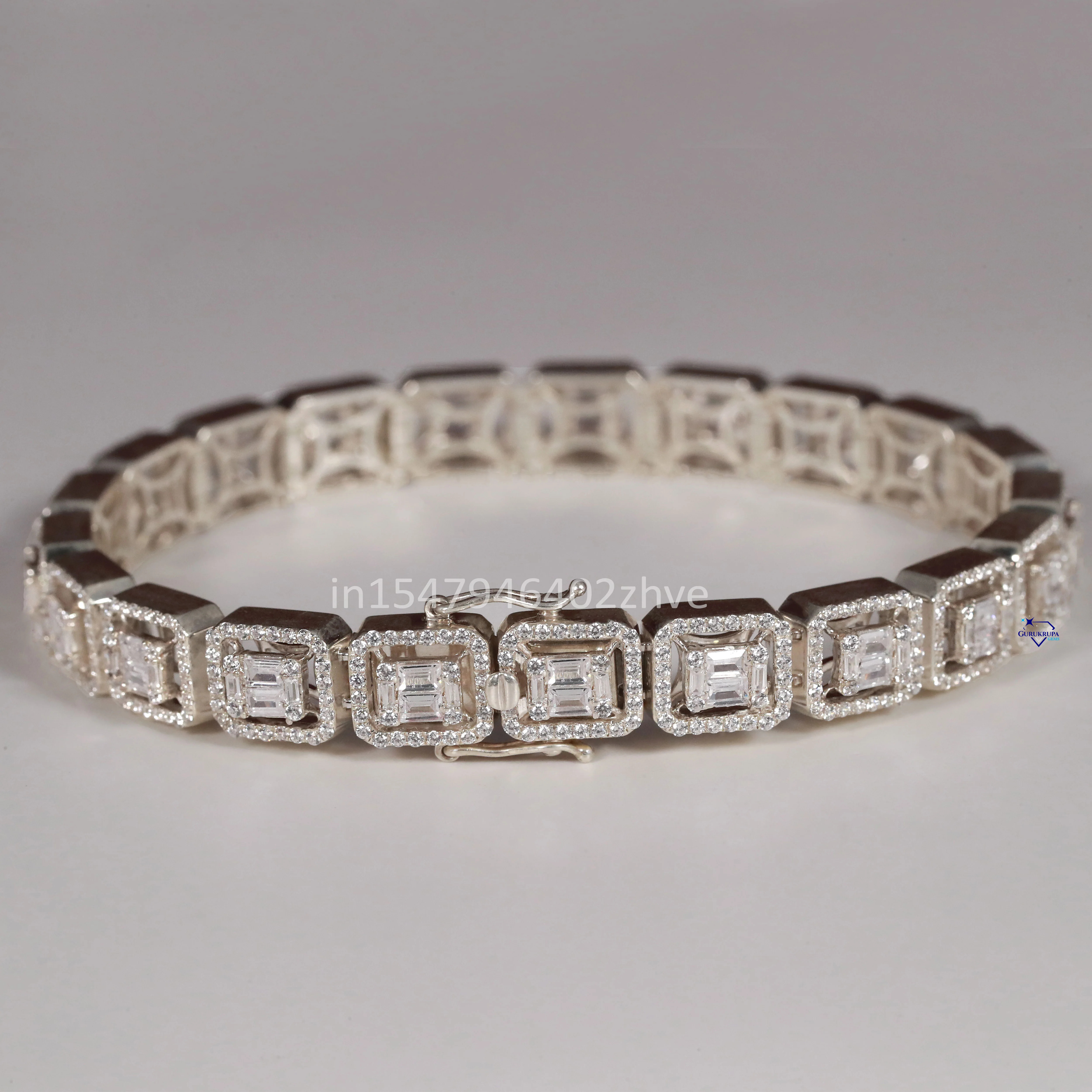 Elegant 14 kt white gold bracelet adorned with marvelous moissanite diamonds exuding a stunning charm with enhanced vvs clarity