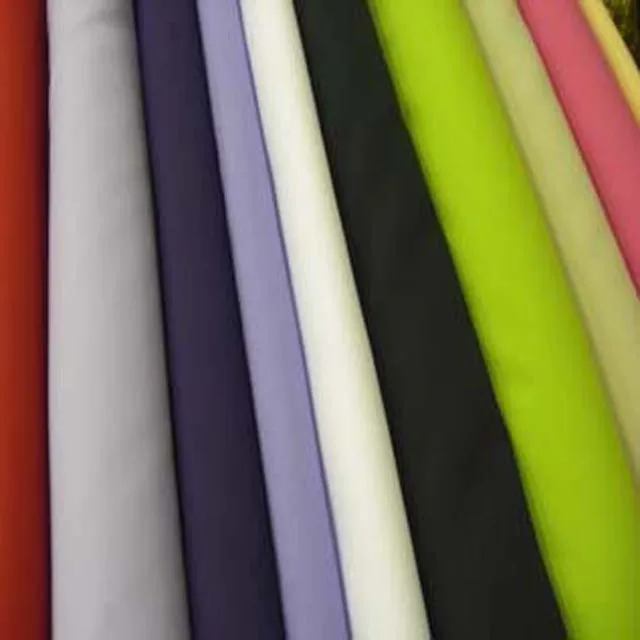 Excellent quality cotton fabric with different colors and available in plain dyed pattern from best exporters for sale