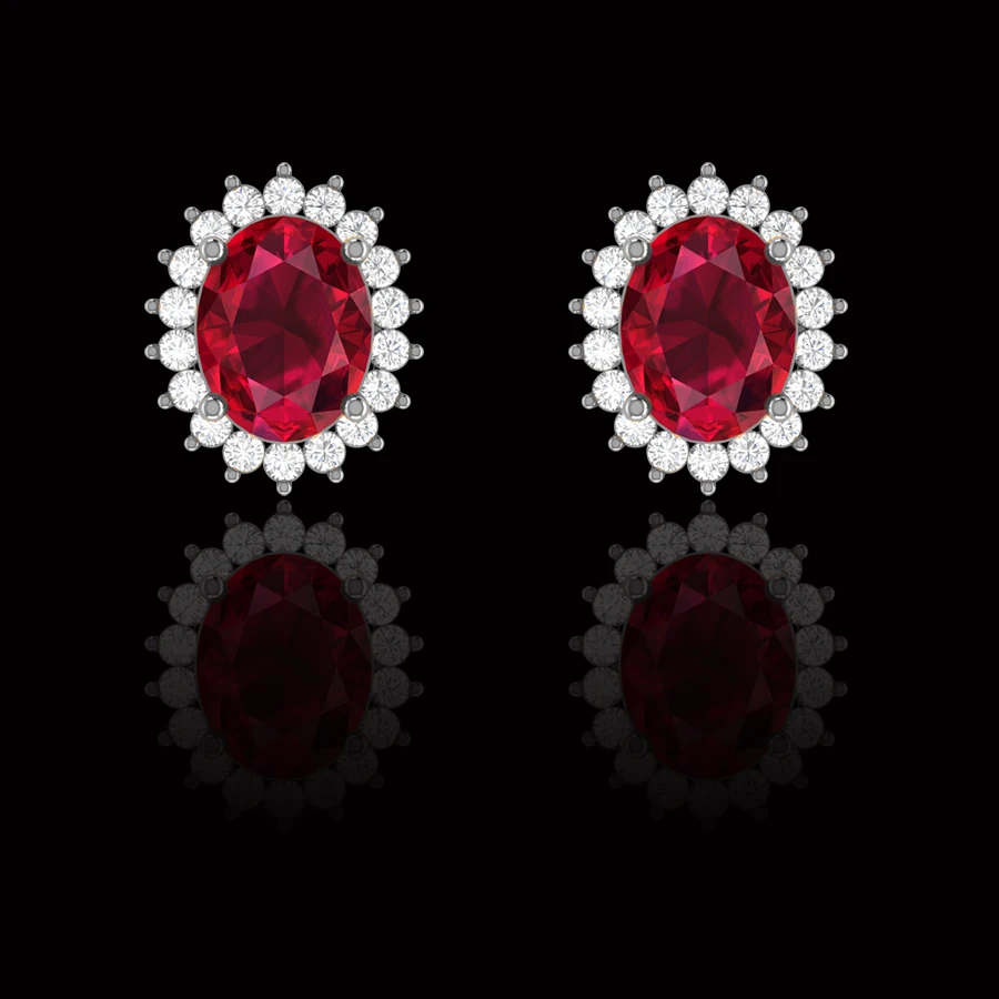 A beautiful pair of cushion cut Intense Red ruby earrings. 5 carats of Ruby 1.8 carats of white round brilliant cut diamonds