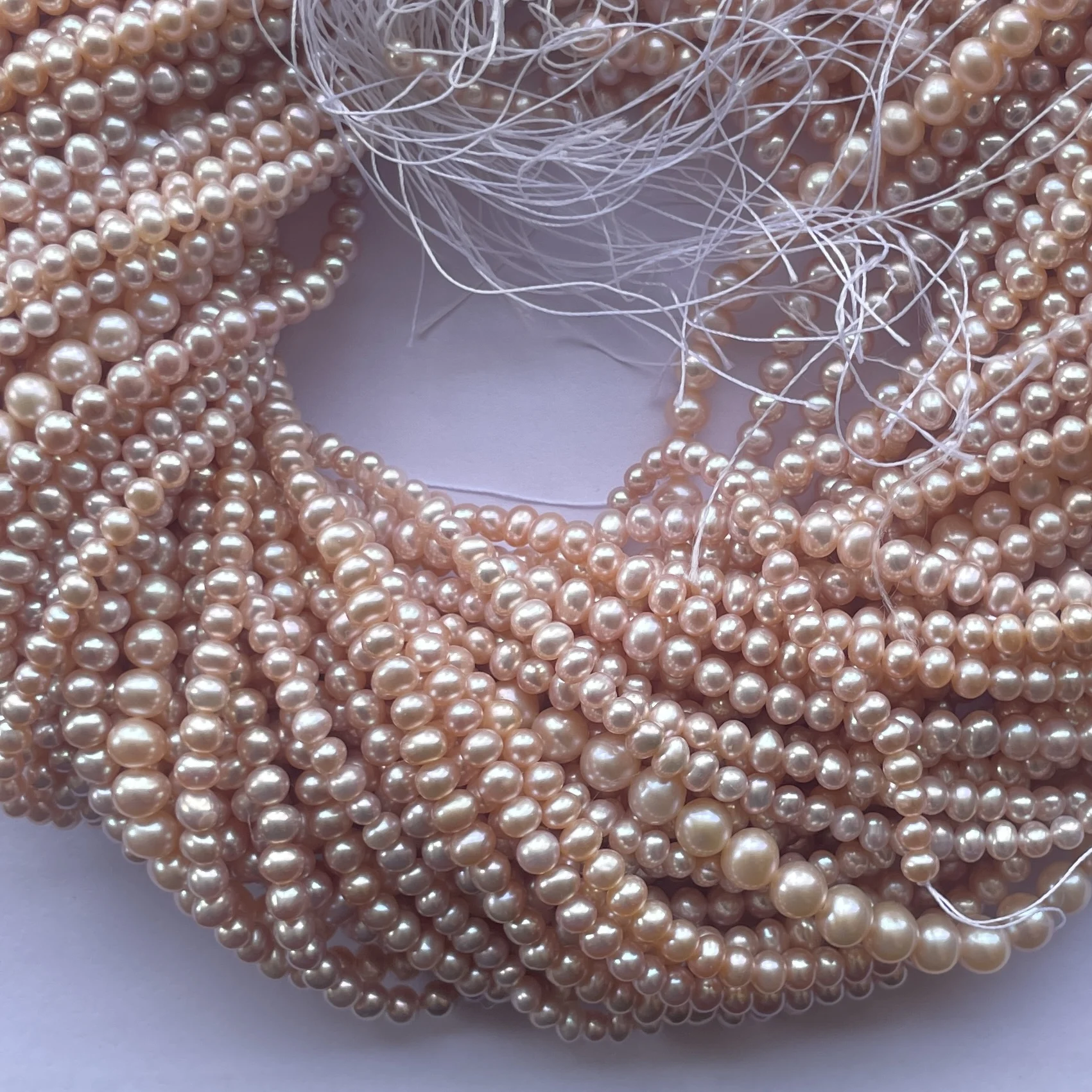 4mm 5mm 6mm 7mm Natural Rose Gold Color Freshwater Pearl Stone Round Beads Strands at Wholesale Price Cultured Pearls Factory
