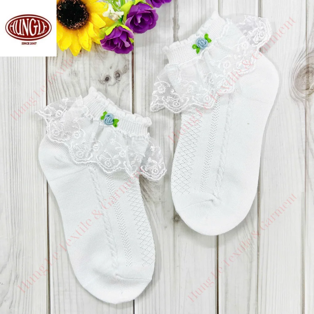 Adorable Hand-Knitted Baby Socks with Floral Embroidery
