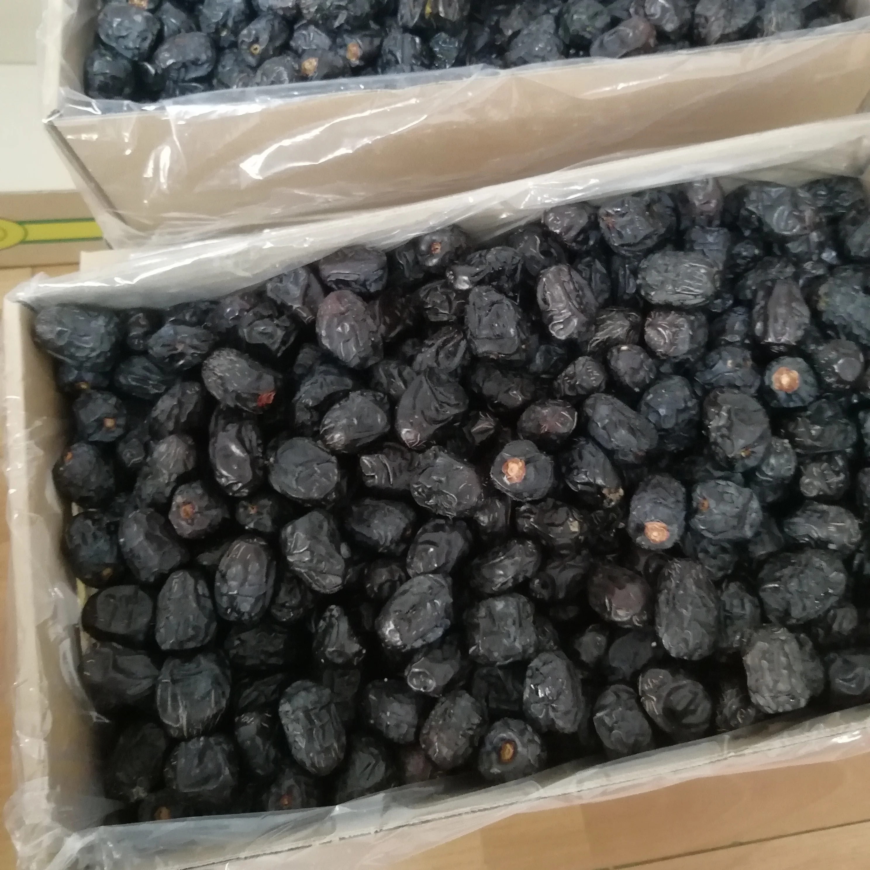Ajwa black dates fresh harvest cheap and good quality from Saudi Arabia from leading exporter of dates