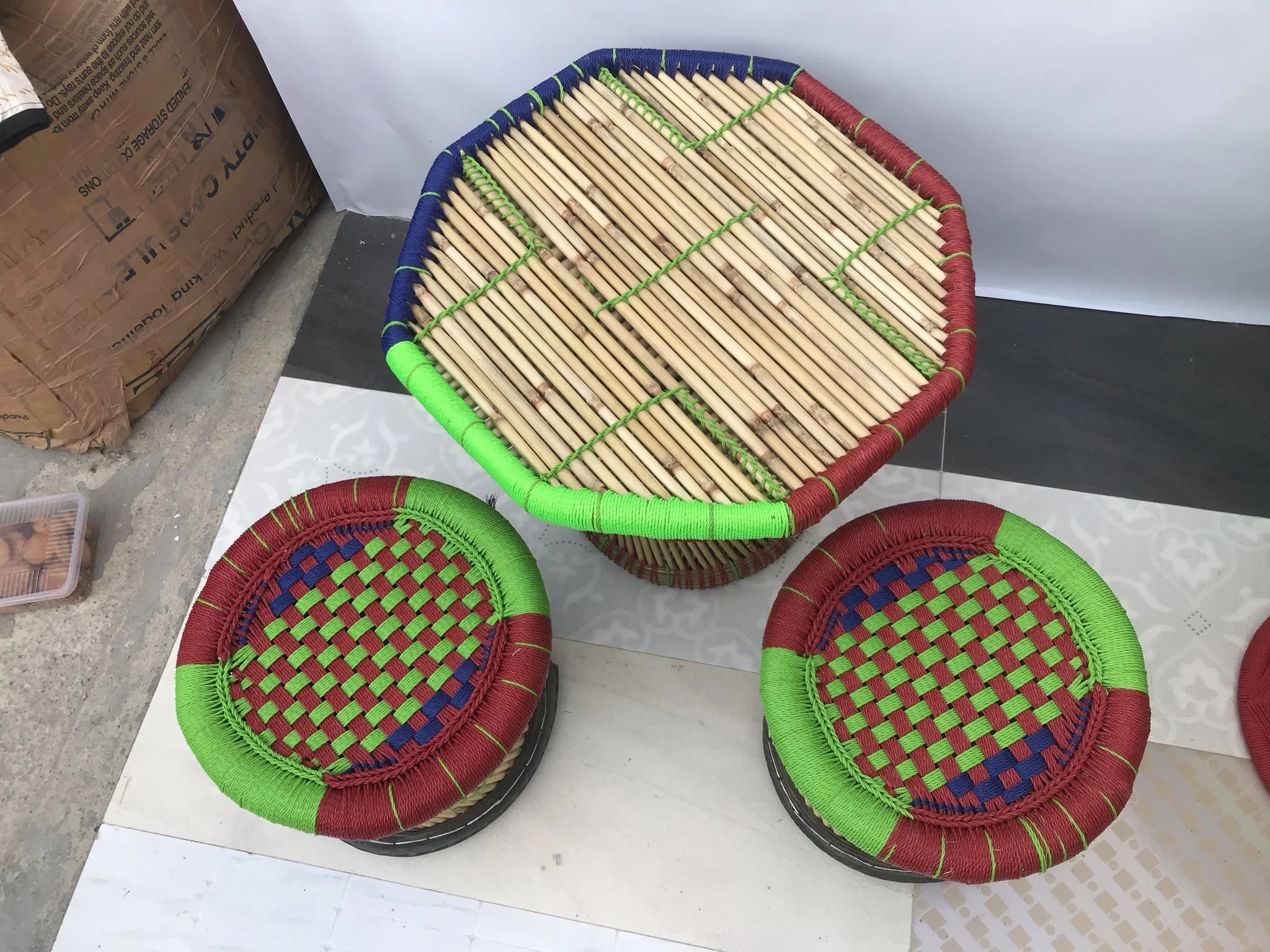 Wholesale Eco friendly Bamboo Rattan Indoor Outdoor Garden Lawn Backyard Furniture 4 Ottoman Stools With Table